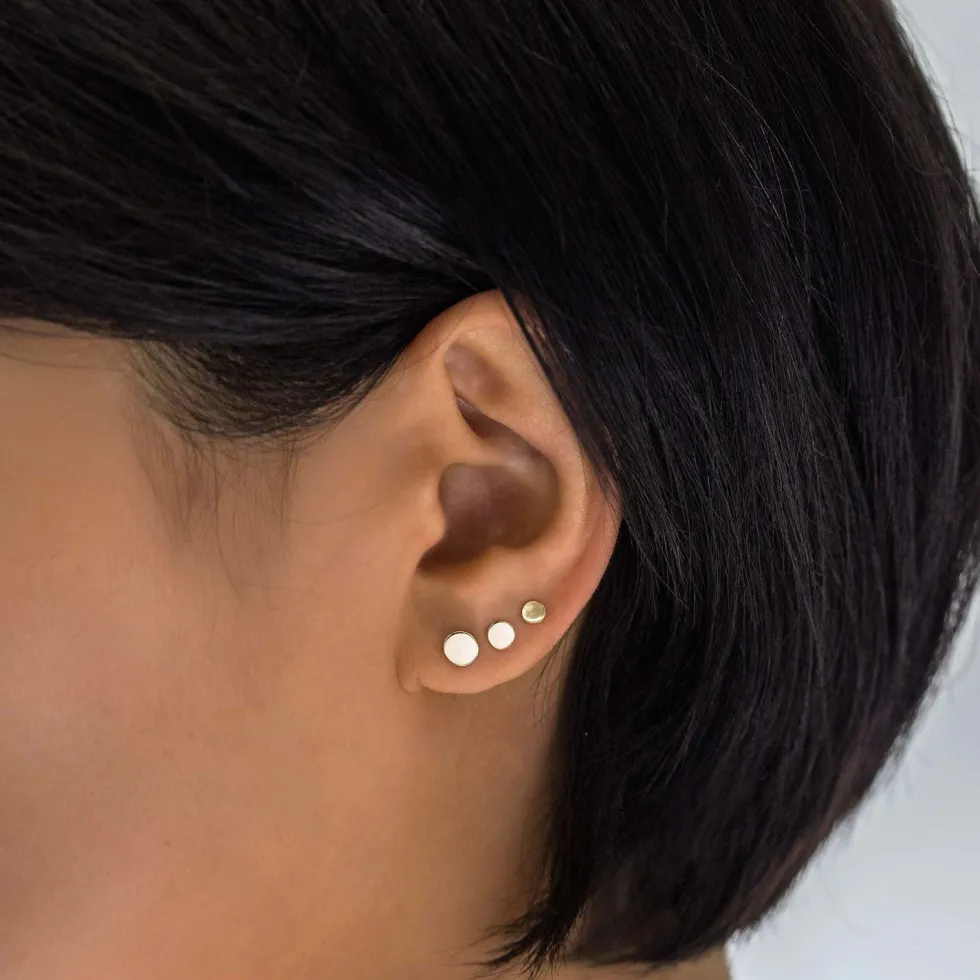 Disc Piercing | Titan